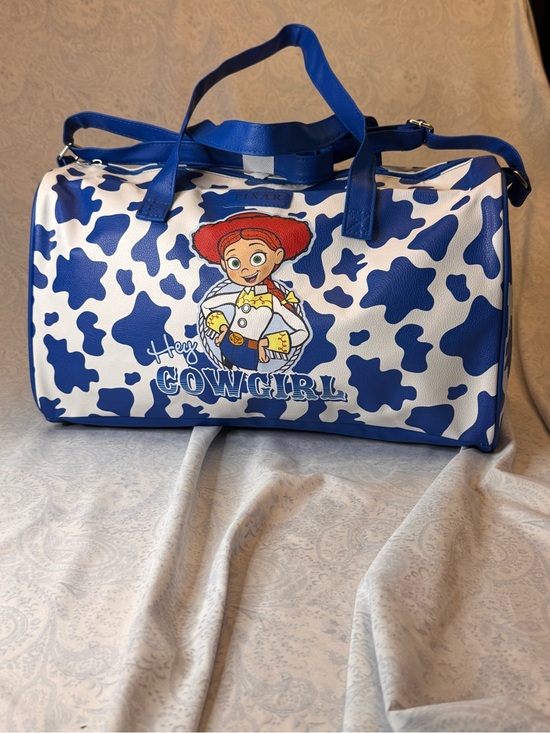 Disney Handbags - Disney Pixar Jessie Cowgirl Duffle Bag in Blue and White